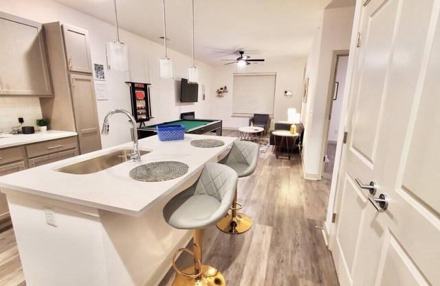 Oliver Capital | Cozy, Entertainment Suite