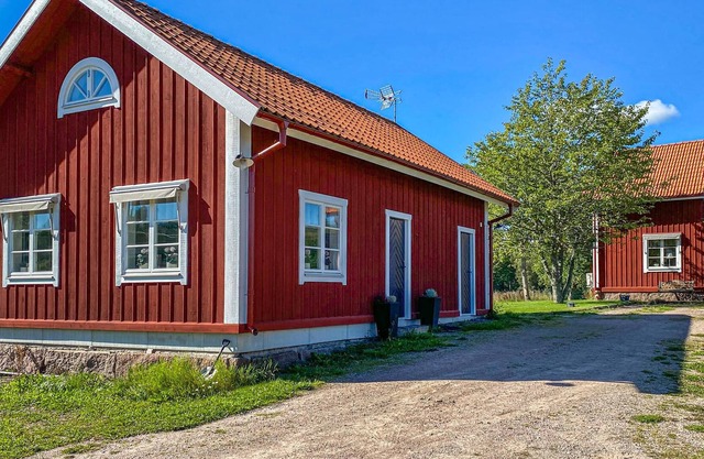 On a farm with goats, horses and a small lake welcomes you this cozy cottage.