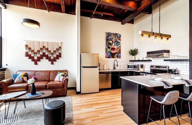 One Bedroom King with Den with views of the heart of downtown.