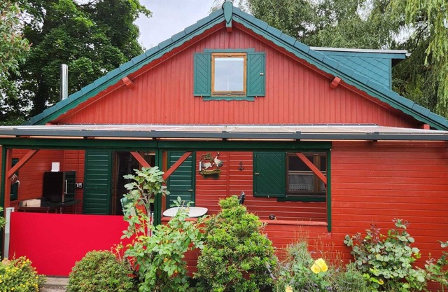 Maison avec galeries ouvertes, ameublement scandinave au calme