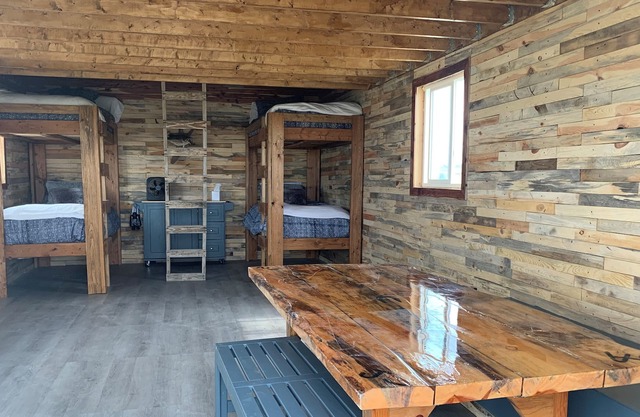 Off the grid cabin with recreation adjacent to a beautiful western NE lake