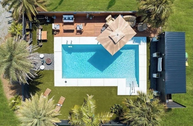 Organically Designed Spacious Home w/ a Resort Style Heated Pool & Private Dock
