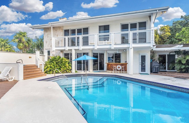 Villa Osprey Bay sur Fla. Bay-a tout! Couchers de soleil spectaculaires, piscine, spa et quai !!