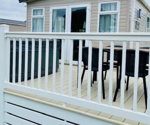 Our Kingfisher 34-4 persons with private hot tub-pet friendly-Tranquil holiday away from it all yet not far from St Austell- The Holiday Home has two bedrooms, living and dining area, equipped kitchen-Decking-outdoor furniture-Fishing lakes-Perfect