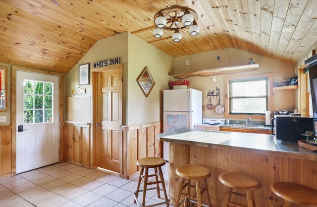 Outdoorsman log cabin near the bay.