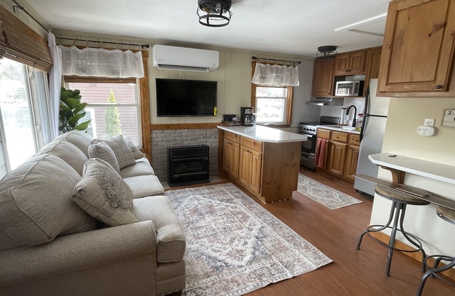 Paugus Bay Cottage waterfront cottage on private island! Walk to Paugus Bay Pub!