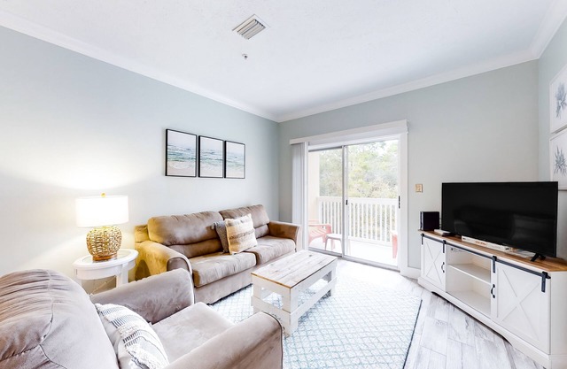 Peaceful condo with pool access, central AC, and washer/dryer