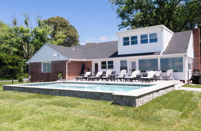 Luxury Waterfront Retreat with in ground pool and close to town
