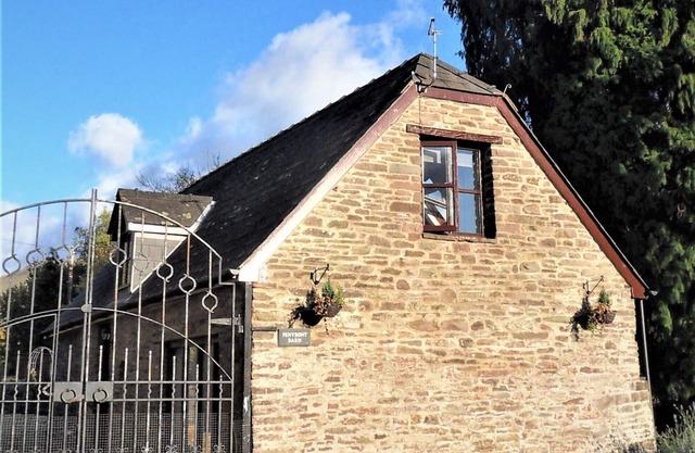 Penybont Barn, une confortable conversion de grange au bord de la rivière à Llangorse, les Brecon Beacons