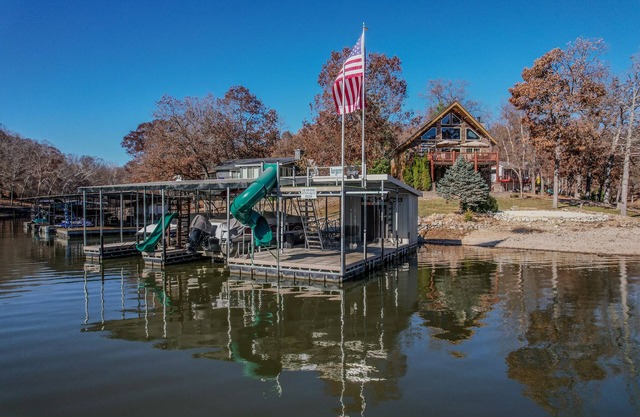 Perfect for the family: quiet cove, private beach, hot tub, boat slips and more!