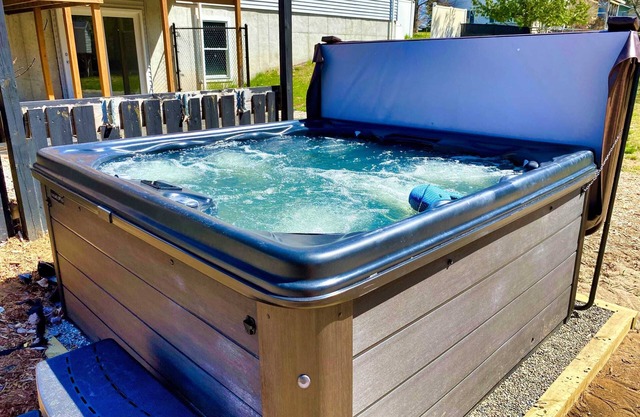 Pet-friendly home with fenced-in yard and hot tub