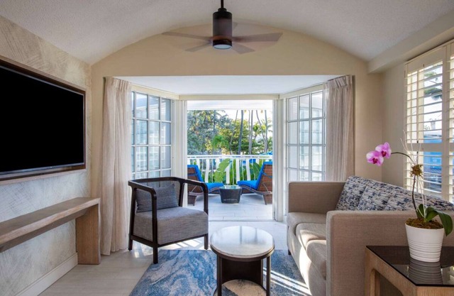 Pool View Suite w/ Living Space and Balcony | Pets Are Allowed | Beach Access