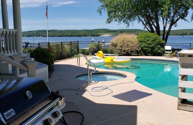 Premier Home on Chautauqua Lake with beautiful covered deck, pool and dock.