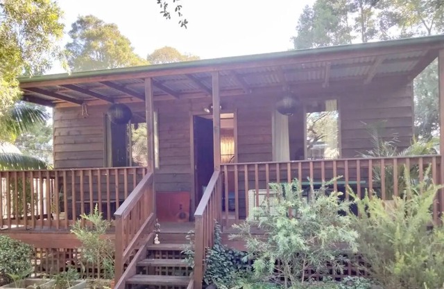Privacy cabin in backyard garden setting 1 Qbed