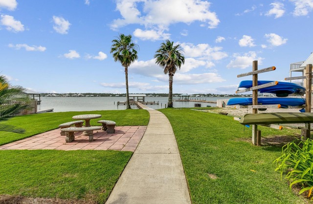 Private Beach Access and On-site boat Launch with slips Snowbirds Welcome