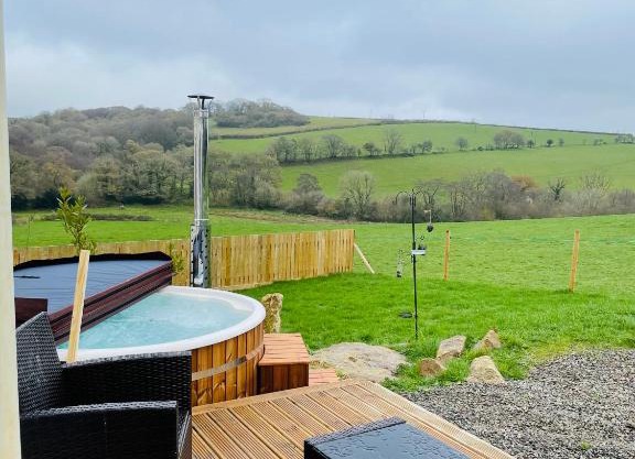 Private country caravan surrounded by fields