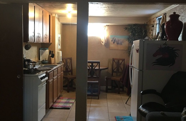 Private furnished bedroom in shared basement
