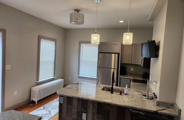 Private furnished studio. Close to hospitals, parks & commuter rail..