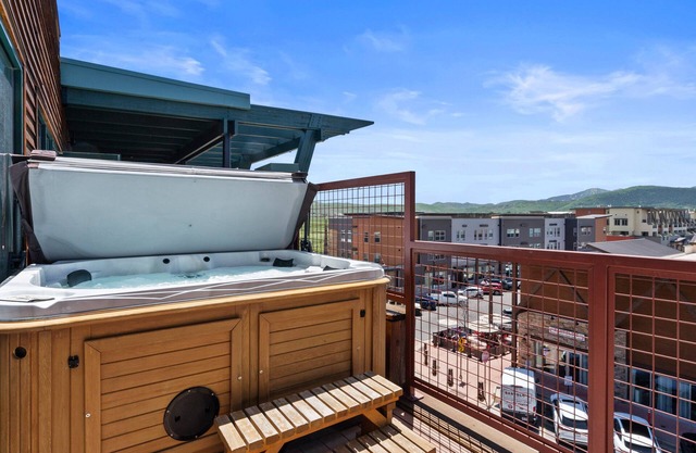 Private Hot Tub | Stylish Top-Floor | Fireplaces, Balcony + Kitchenette