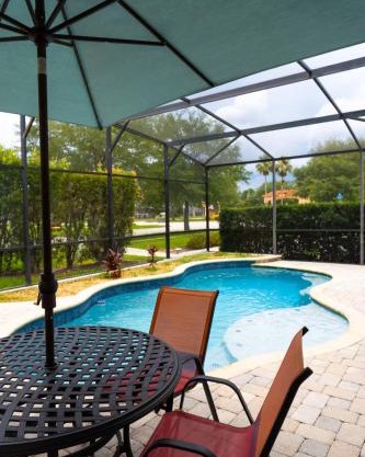 Private pool home close to Disney with resort ammenities