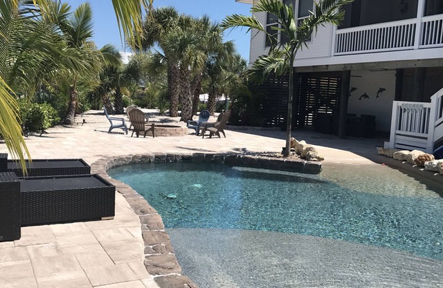 PISCINE PRIVÉE paisible Palm Island-Coconut Cottage! $ SPÉCIAL POUR UN SÉJOUR DE 3 MOIS $