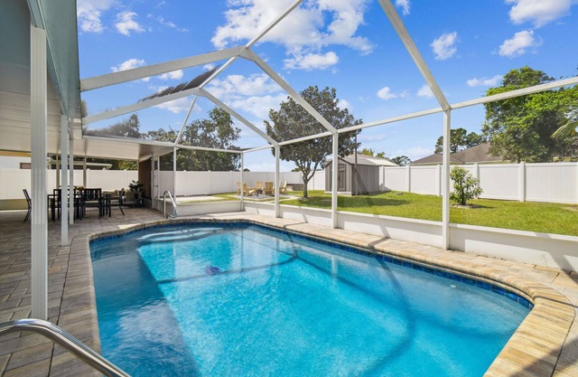 Private Salt Water Heated Pool, expansive patio + outdoor kitchen