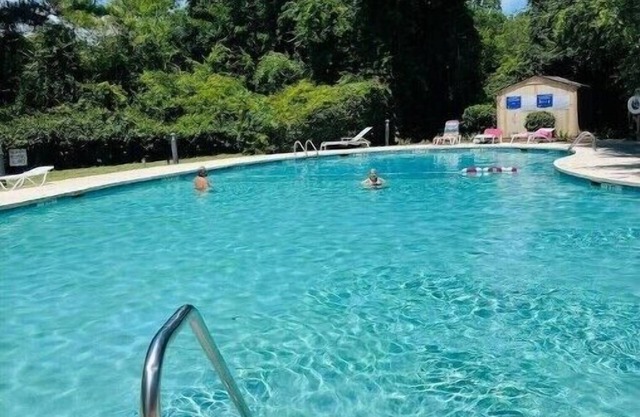 Private Spacious condo with a Pool a 1 mile from beach