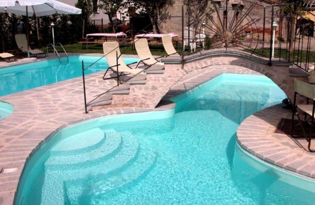 Maison de vacances privée avec bain à remous, climatisation, WIFI, piscine privée, TV, véranda