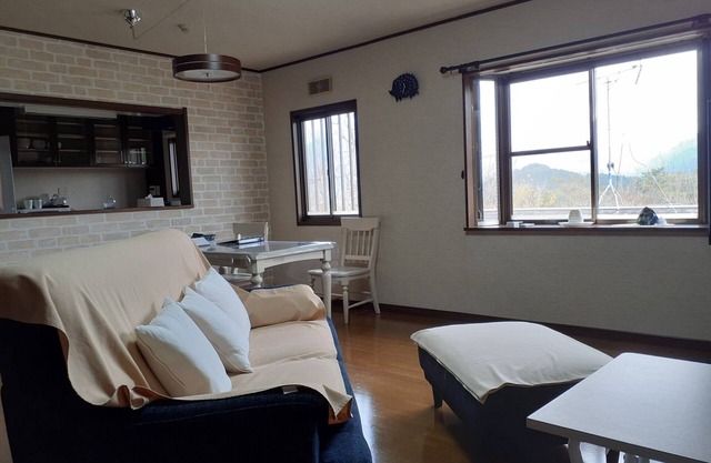 Private villa with private hot spring panoramic v / Yufu Ōita