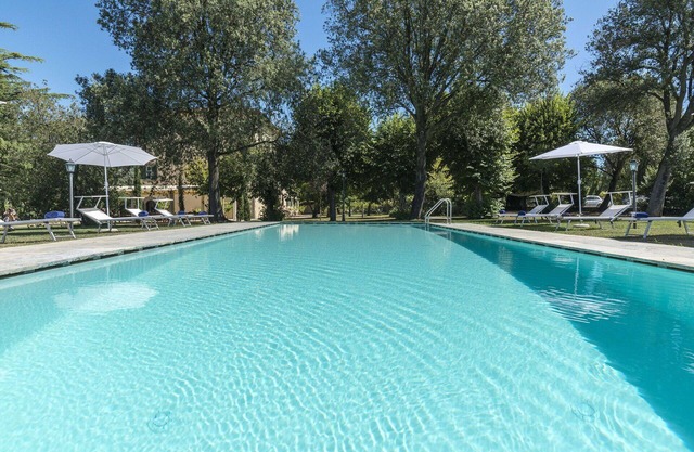 Maison de vacances privée avec bain à remous, WIFI, piscine, climatisation, TV, patio