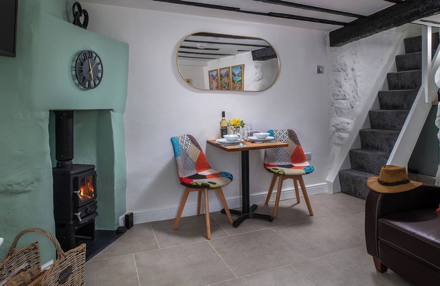 Quaint, charming cottage featuring cosy log burner