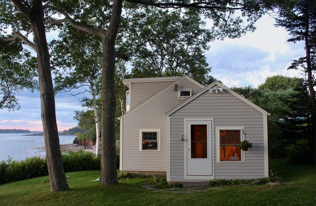 Quaint cottage intimately set on the rocky coast overlooking Casco Bay
