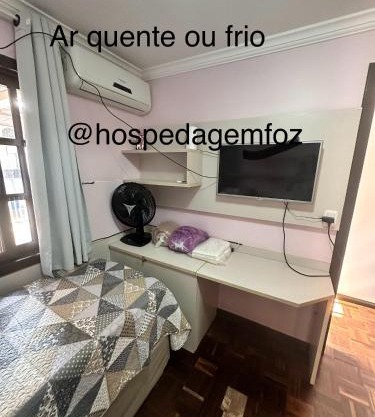 Quarto Deluxe em Foz piscina wifi estacionamento cozinha E AR