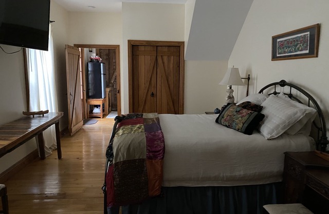Chambre privée petit salon et coin cuisine.