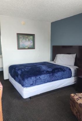 Queen Bed Hotel Room 128