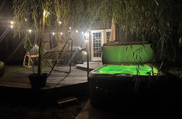Downtown Fishers house retreat “pet friendly” hot tub.