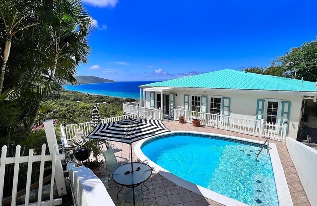 Quiet hillside villa with expansive sea, beach, and mountain views...