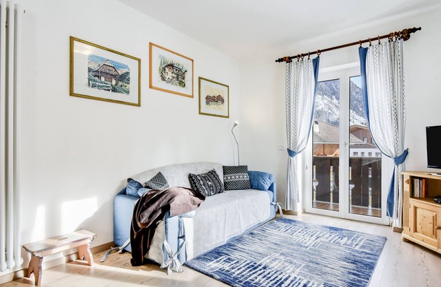 Appartement de vacances calme "Ciasa Christina" avec Wi-Fi, balcon et vue sur les montagnes.
