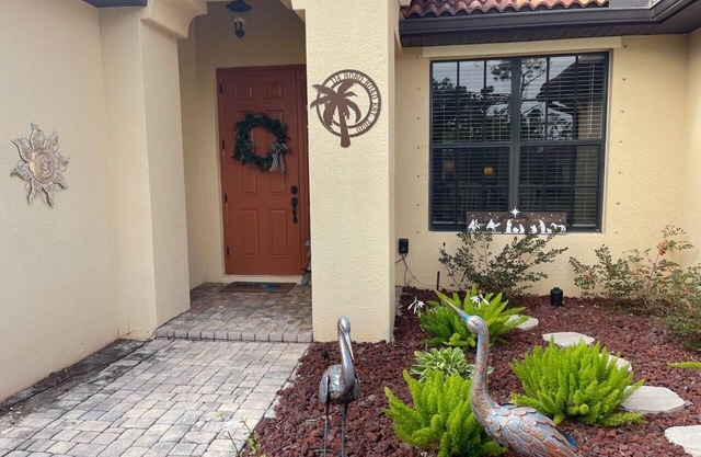 Quiet neighborhood and heated pool. 4 bedroom, three bathroom home.