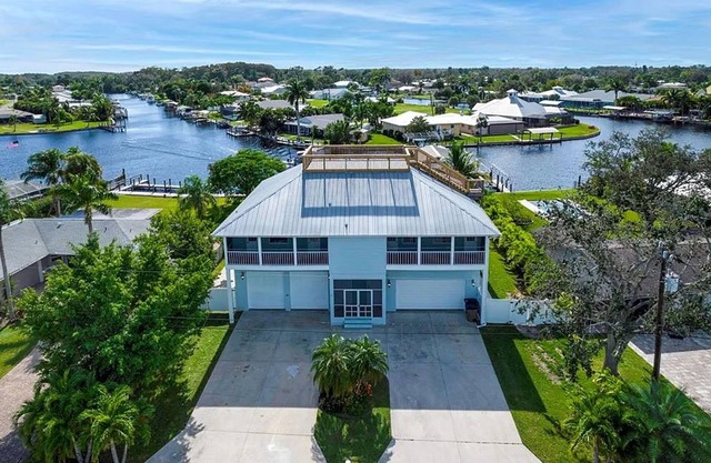 Raised home right on the Caloosahatchee River. Come enjoy the water and weather