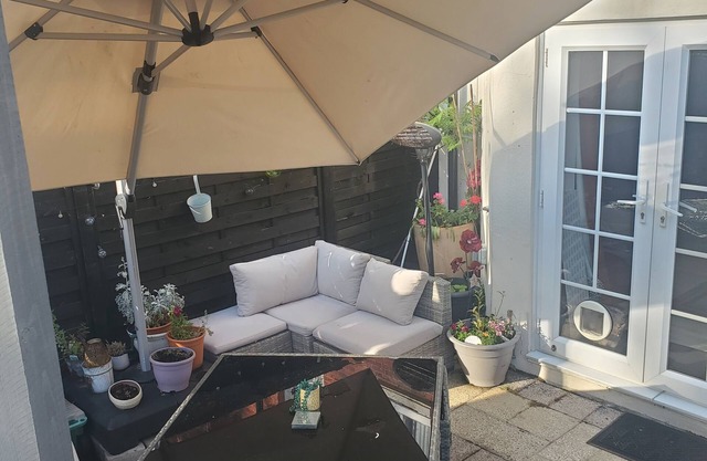 Rare basement flat in best location,free parking on site, private sunny patio