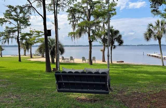 Rare bay waterfront home with 145' of SANDY BEACH!!! Pets welcome!!