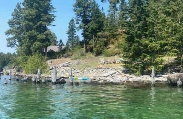 RARE FIND: Over 200' of Flathead Lake Lakefront with distinctive home