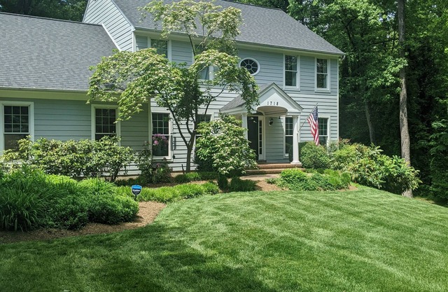 RARELY AVAILABLE FOR COMMISSIONING WEEK! Stunning colonial on a private 1.6 acre lot!