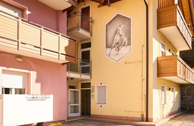 Refined Apt in the heart of the Giudicarie Valleys, just steps from Terme Comano