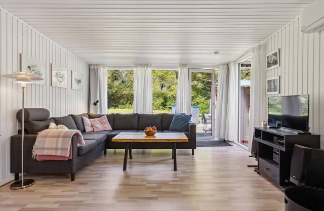 Relax by the sea and enjoy your holiday in an inviting holiday home.