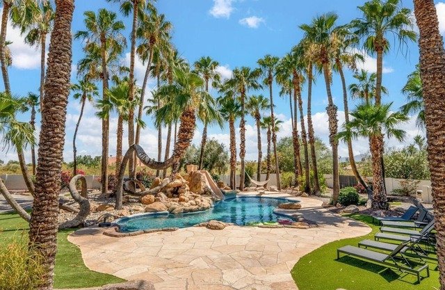 Relax in luxury at our 7-bed, 5-bath estate with rooftop deck, pool, and more!