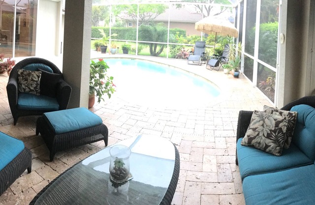 Relax in paradise. Modern 4 bed, 3 bath Pool home in secure and gated community