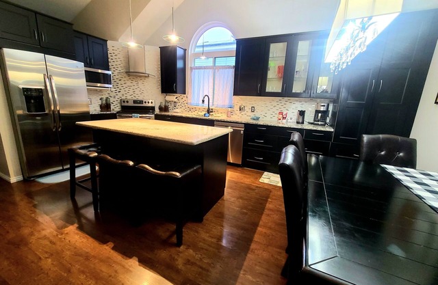 Relax in the Hot Tub, Sleep in Comfort on a King Bed, Play Pool, Charge Your EV