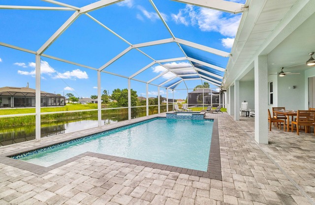 Relax & Unwind: Canal-Front Escape with Pool & Lanai